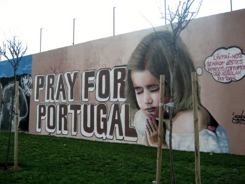 Portugese jongeren protesteren via enorme muurschilderingen